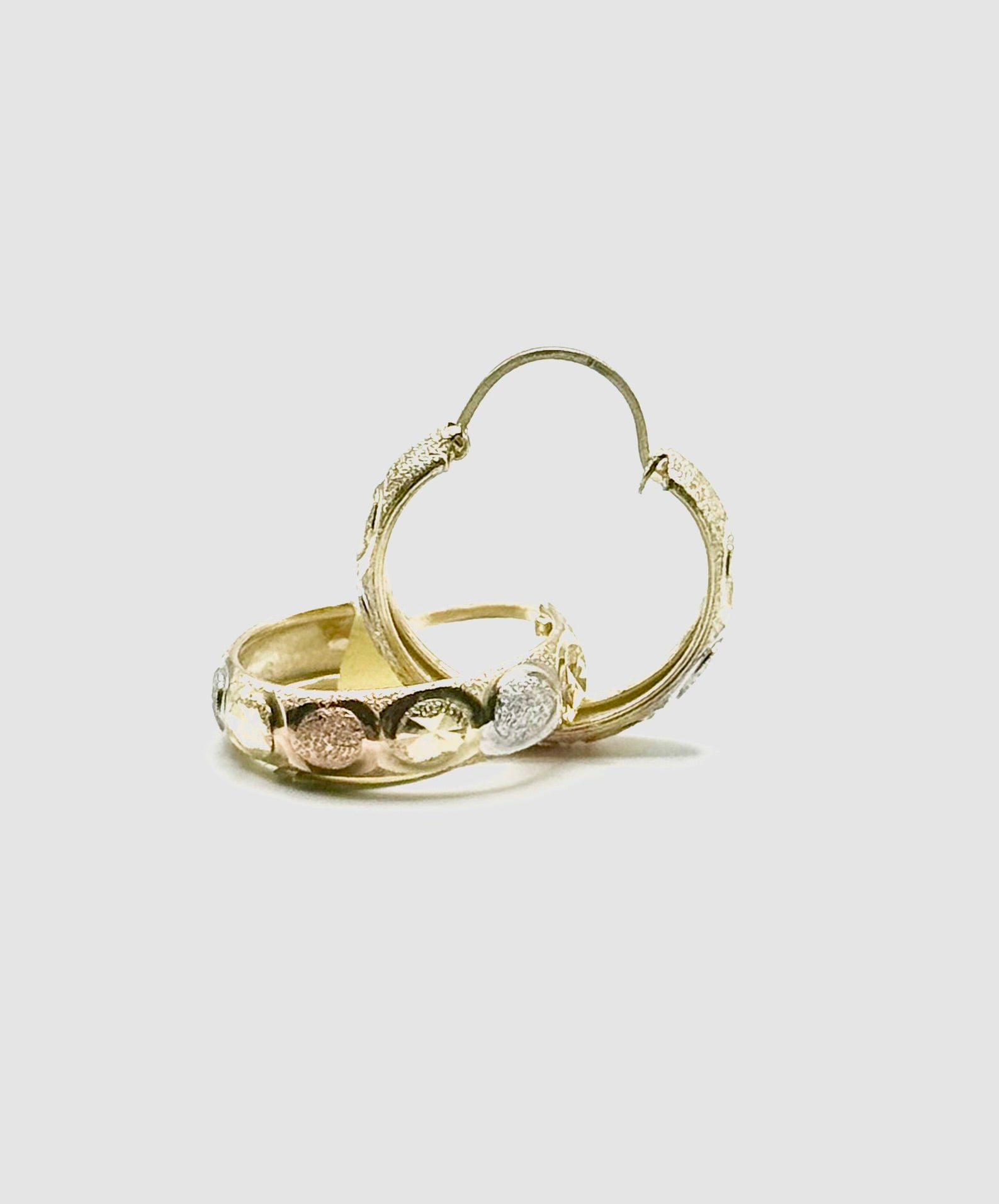 Woman’s 14k hoop earrings three colored