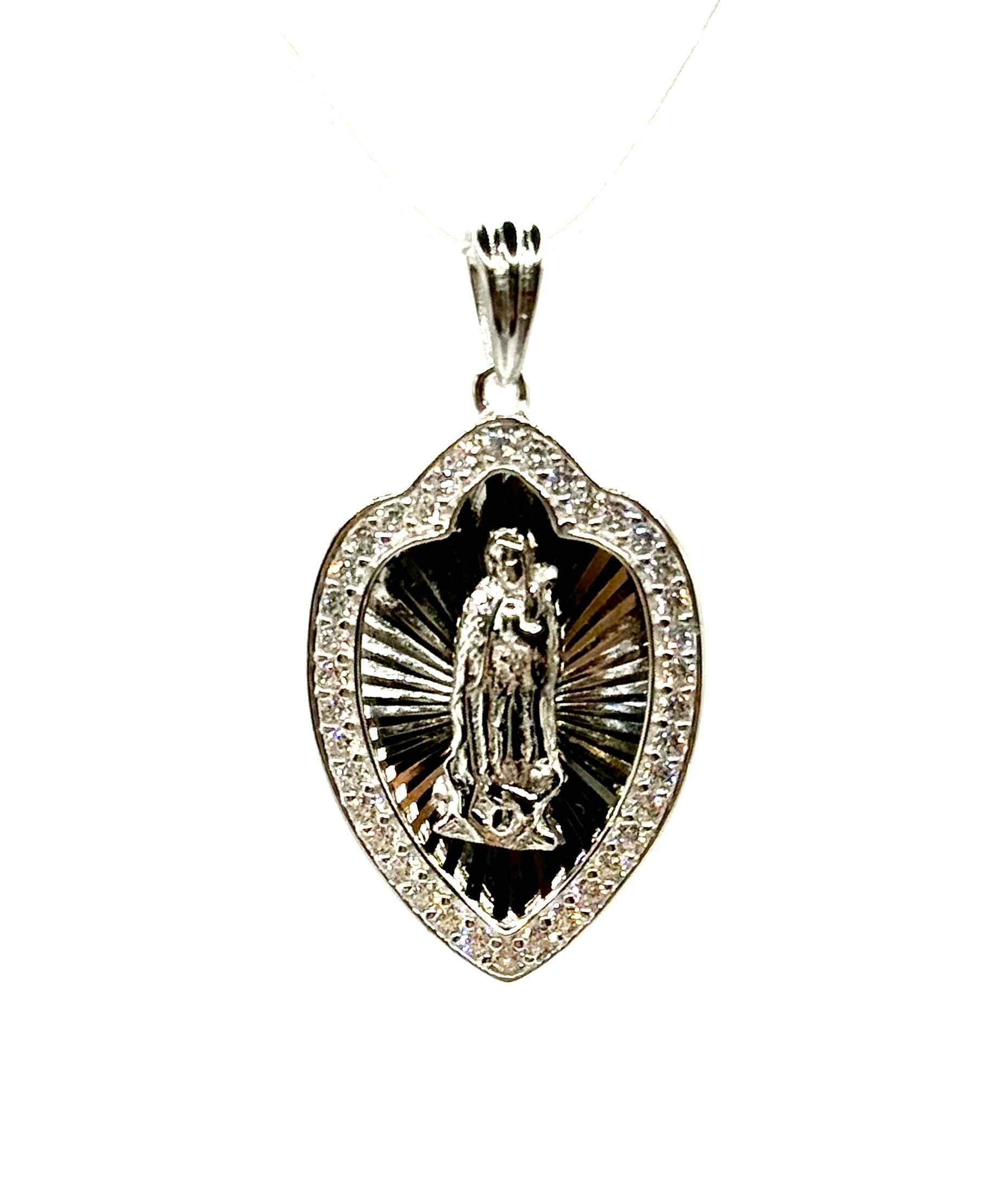 Virgin Mary spade shaped pendant