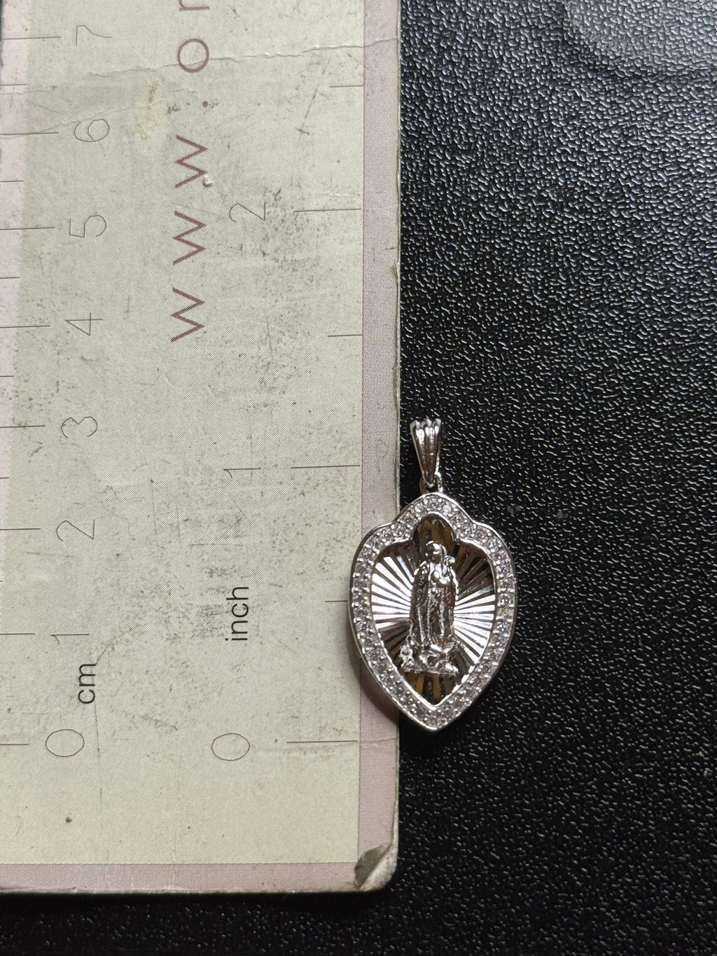 Virgin Mary spade shaped pendant