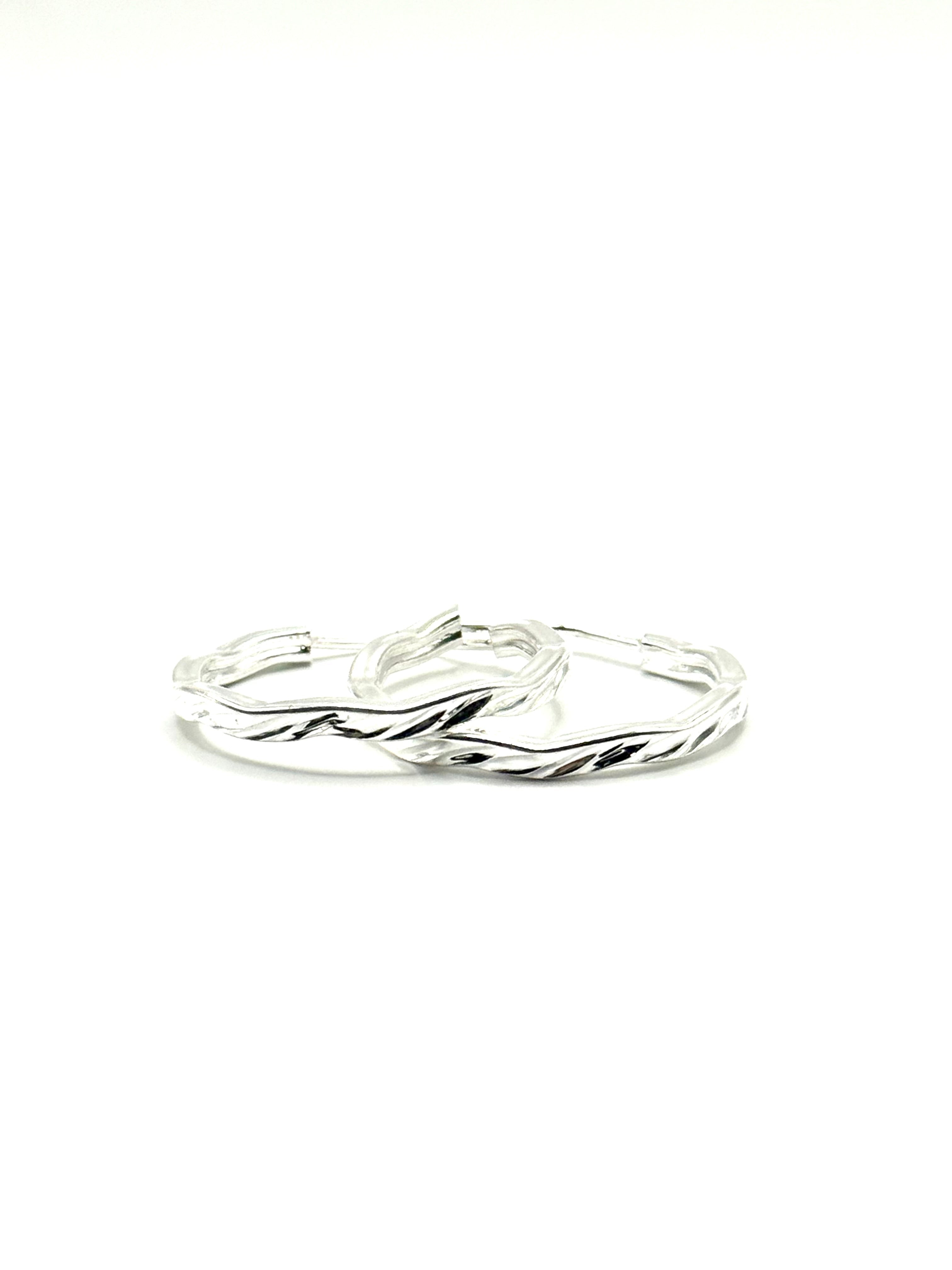 Woman’s slim hoop earrings