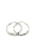 Woman’s slim hoop earrings