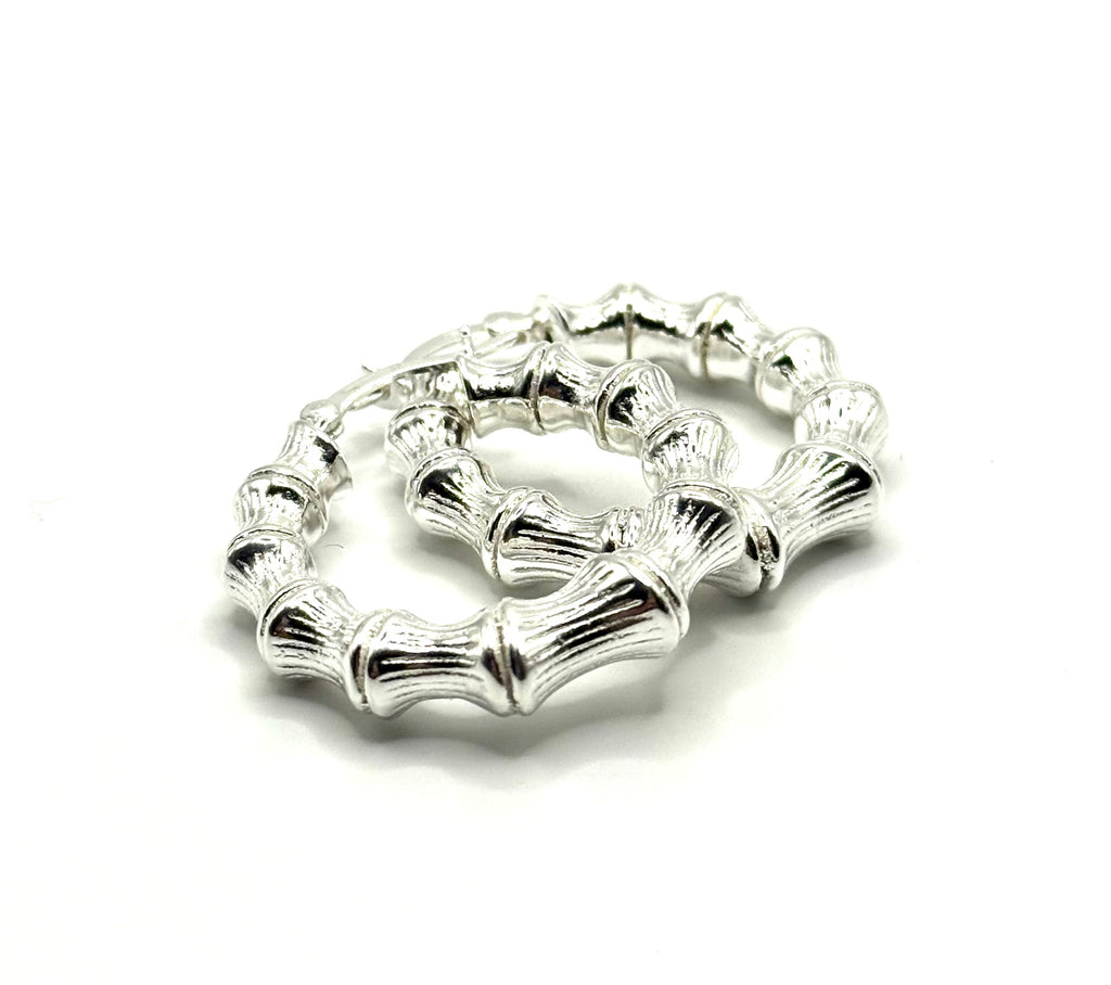 Woman’s hoop earrings tube design