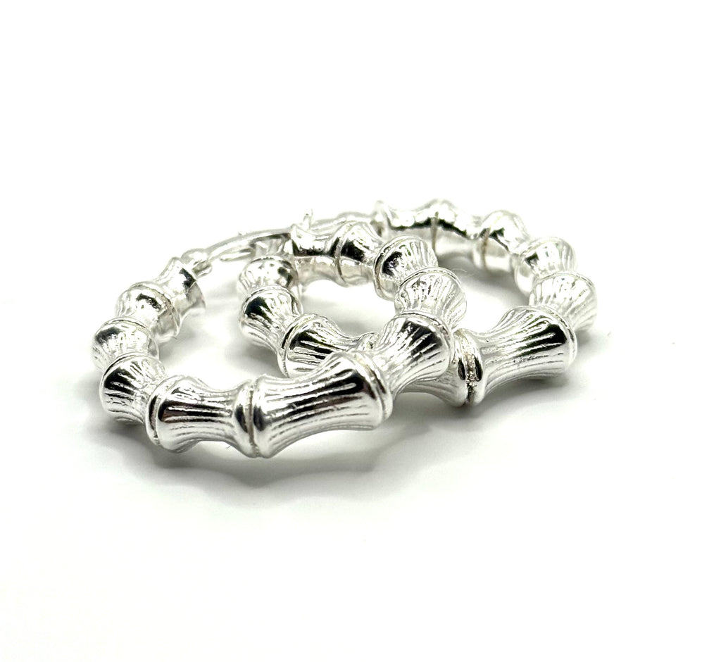 Woman’s hoop earrings tube design
