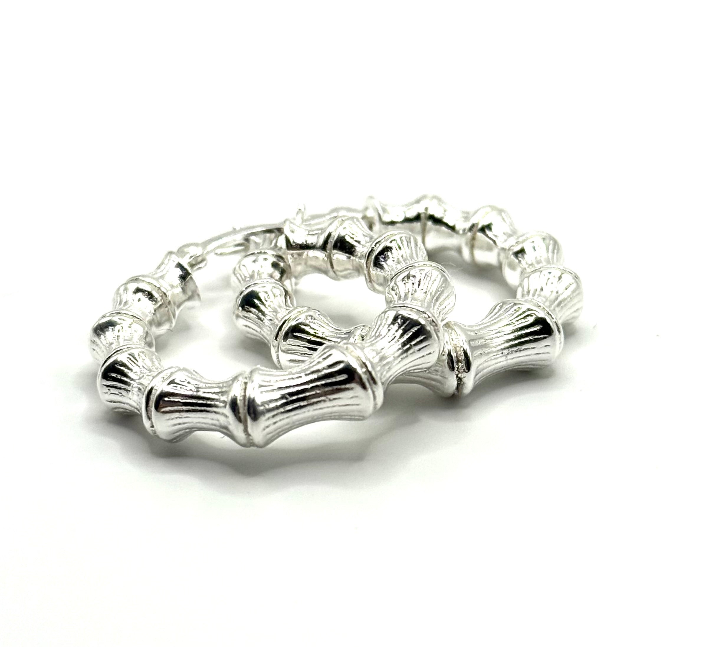 Woman’s hoop earrings tube design