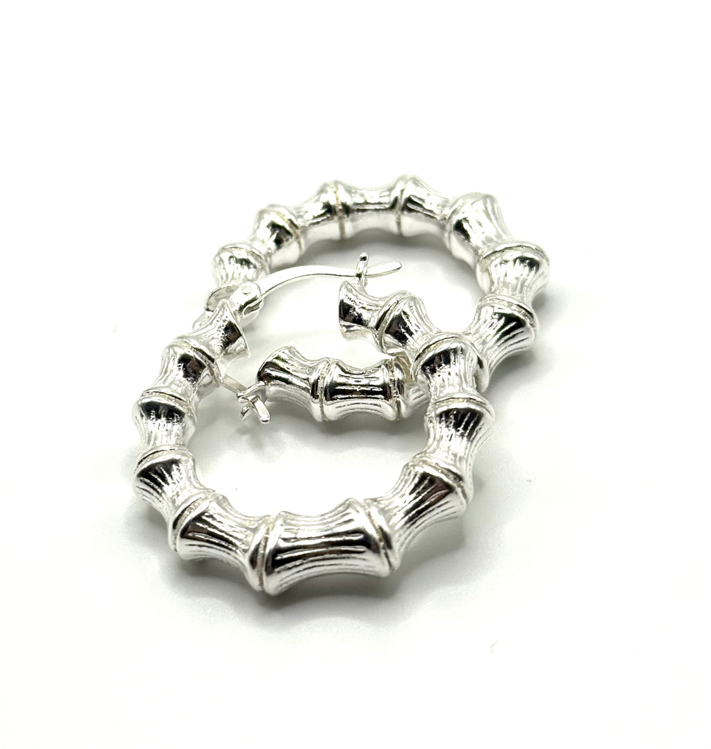 Woman’s hoop earrings tube design