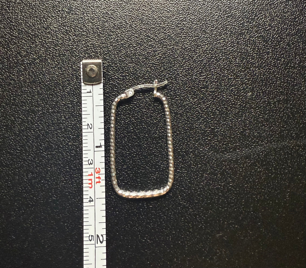 Woman’s rectangular hoop earring’s