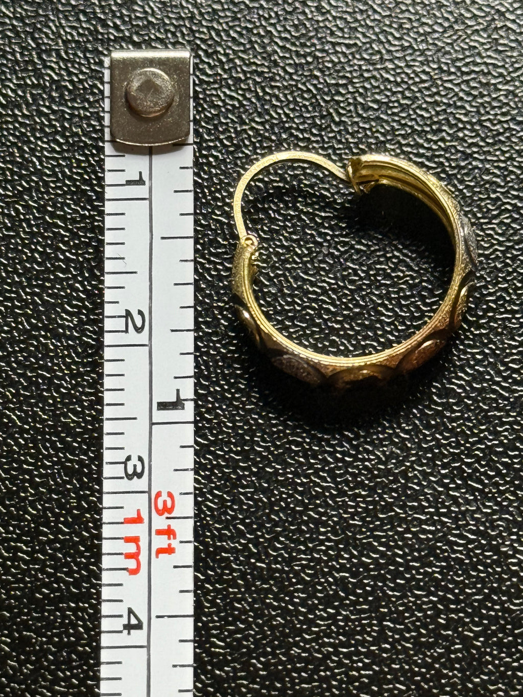 Woman’s 14k hoop earrings three colored