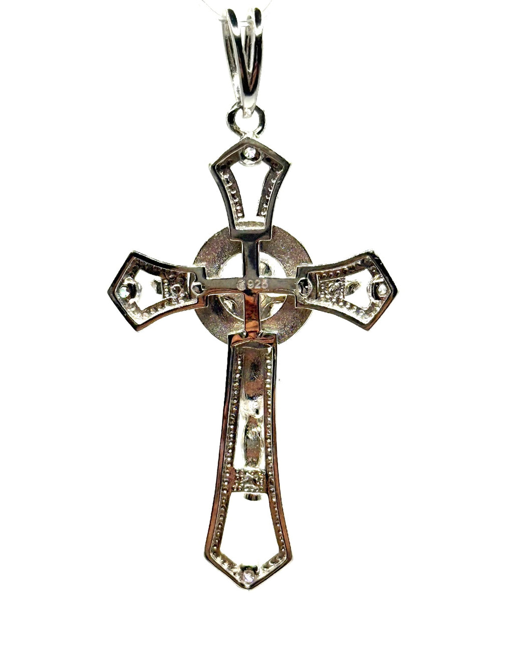 Silver cross with bezel setting