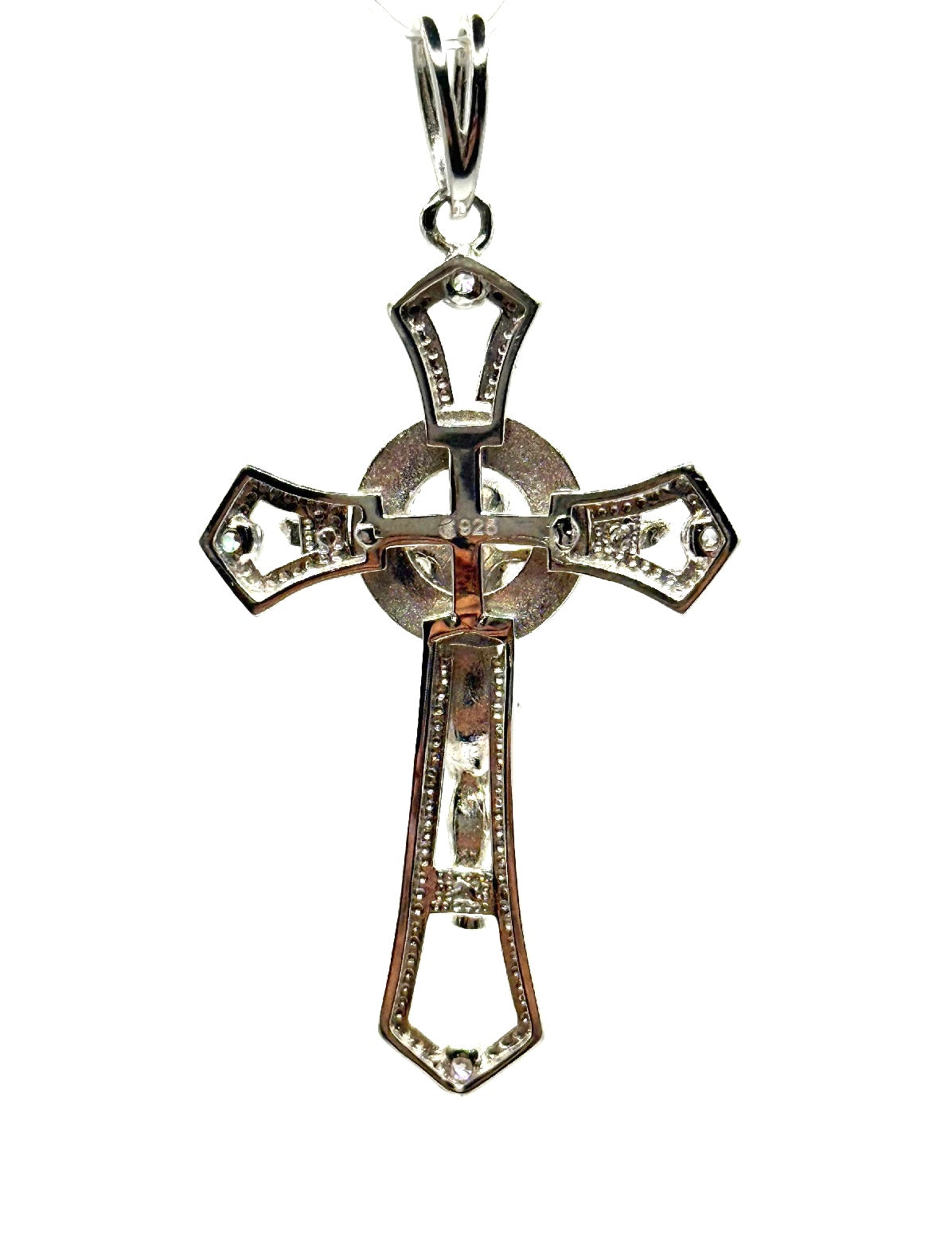 Silver cross with bezel setting