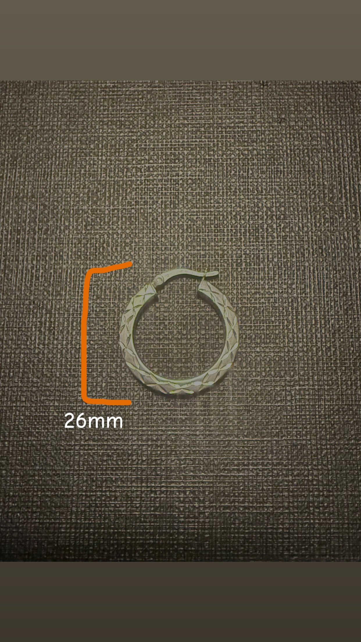 Woman’s diamond cut hoops