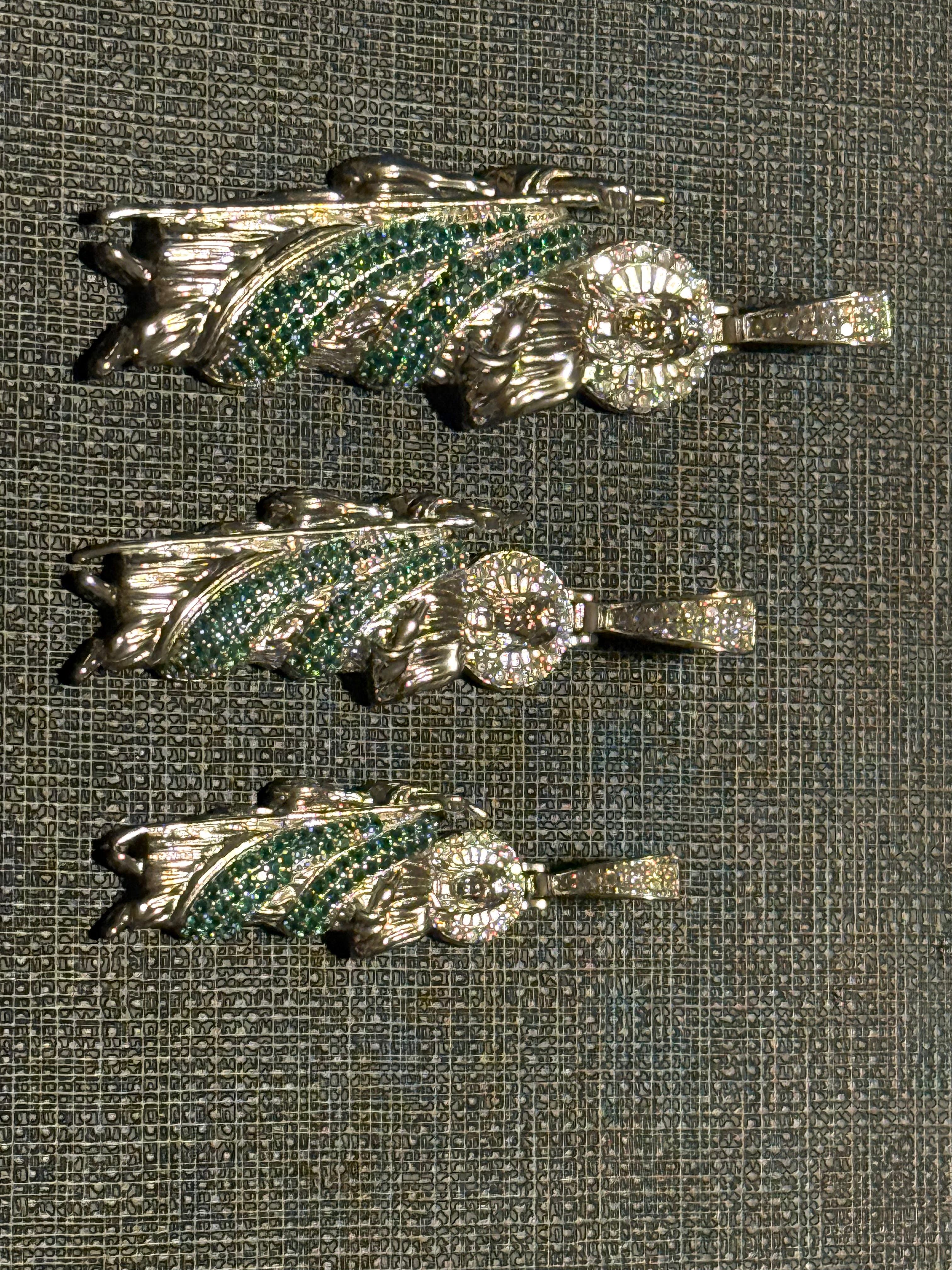 Men’s San Judas rhodium plated (Green stones)