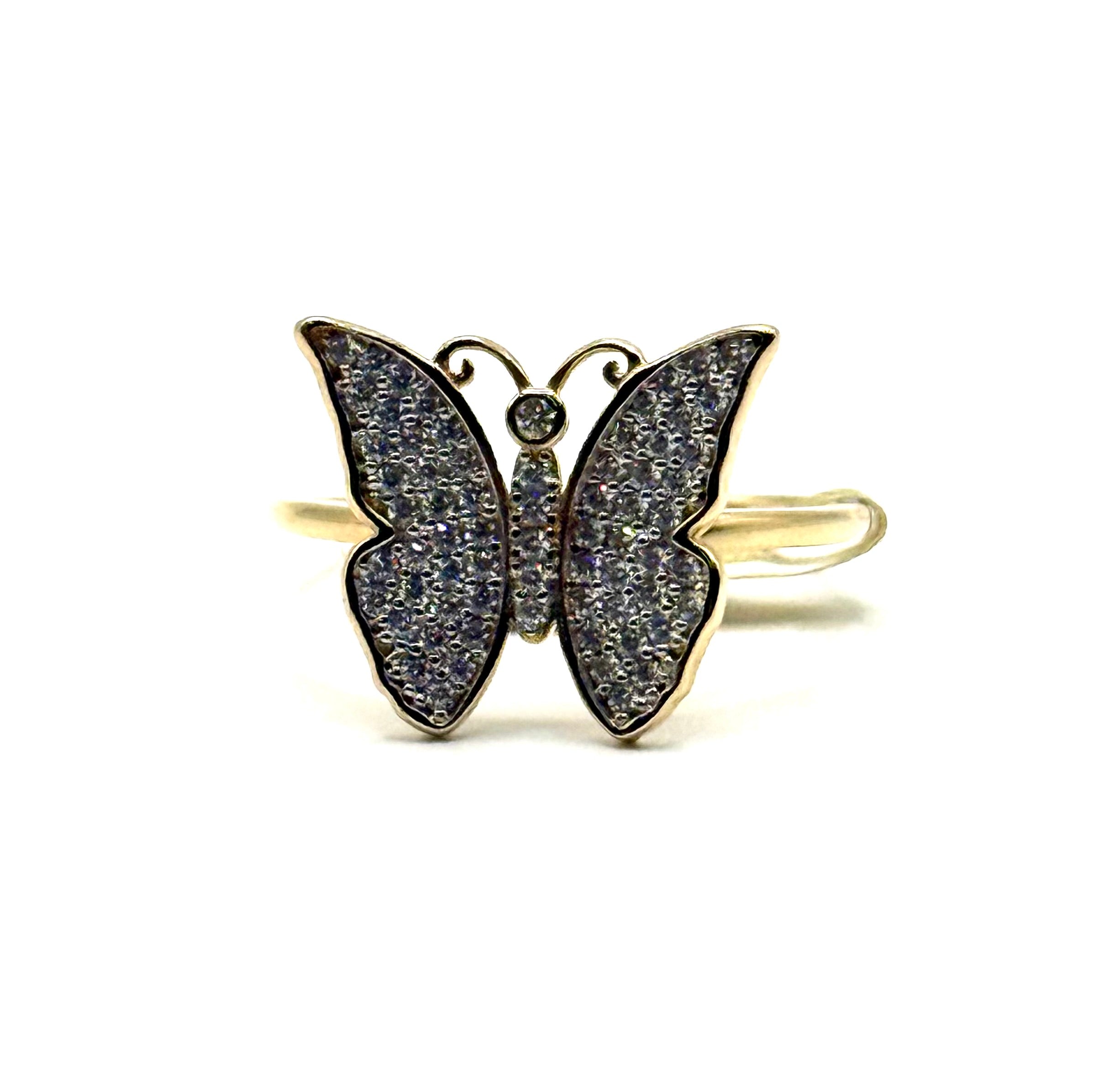 Woman’s iced out butterfly ring