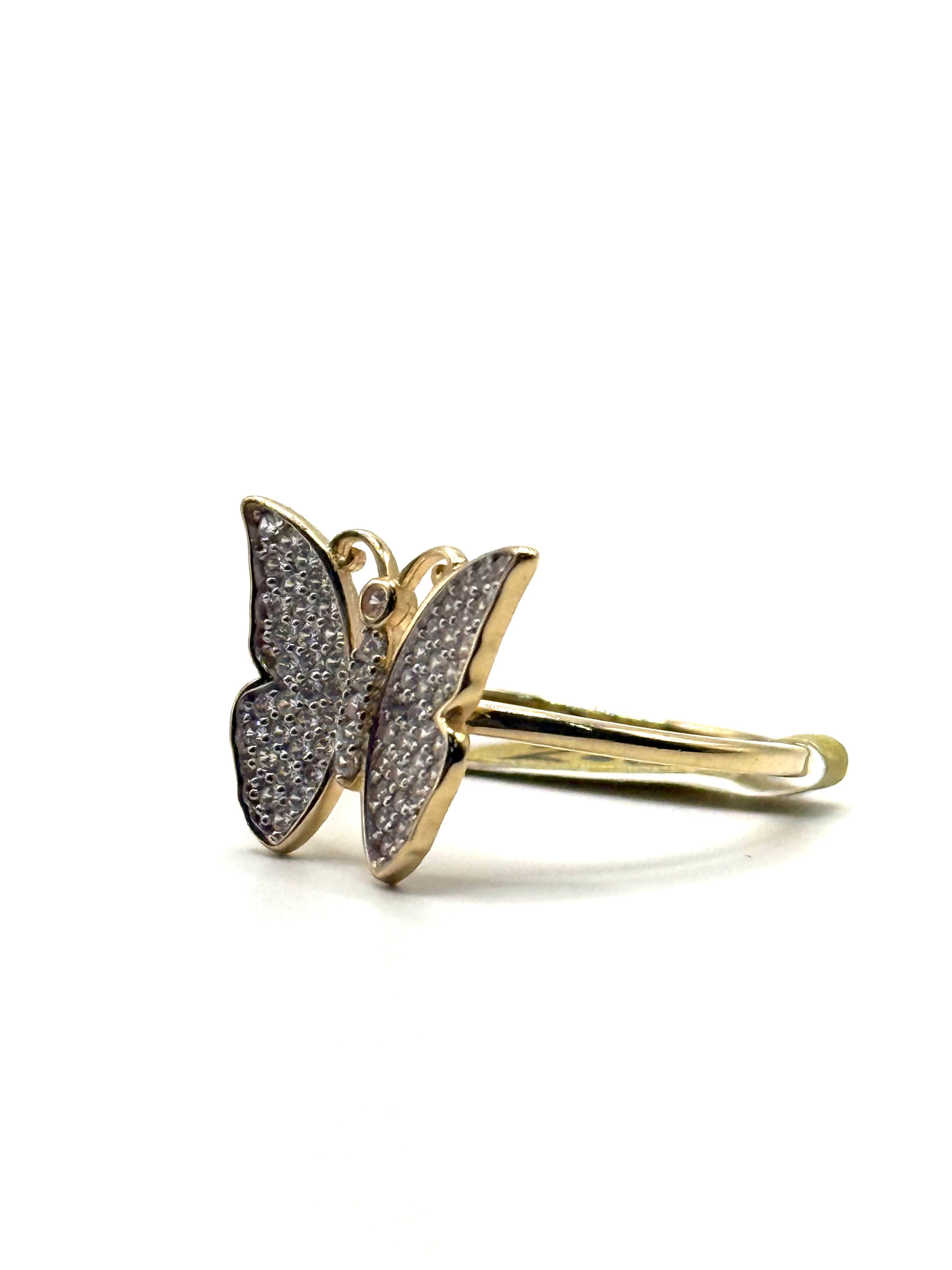 Woman’s iced out butterfly ring
