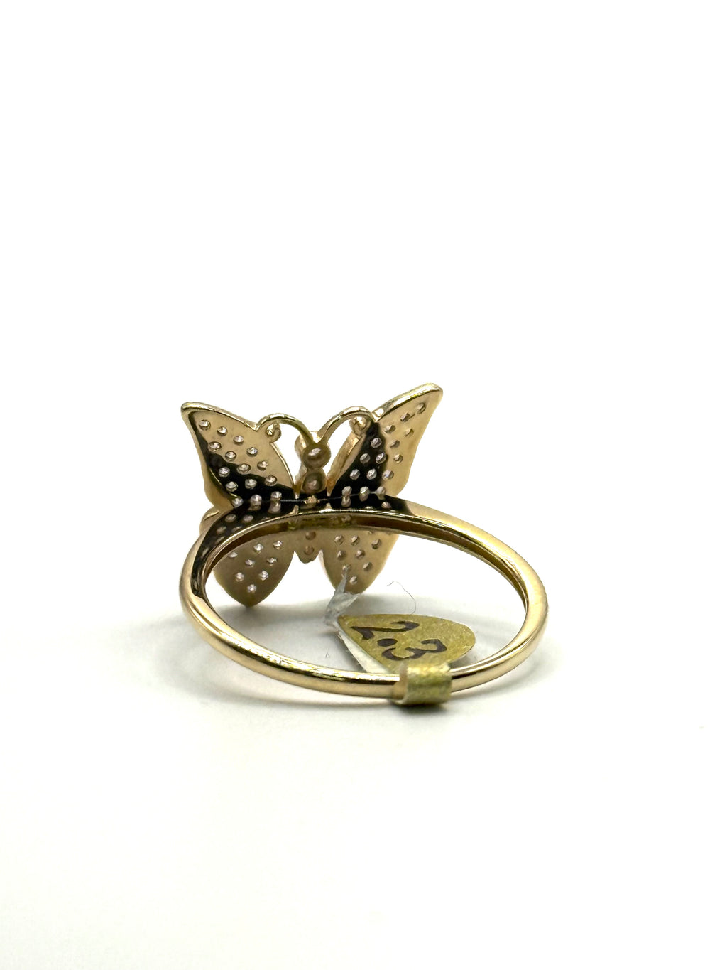 Woman’s iced out butterfly ring