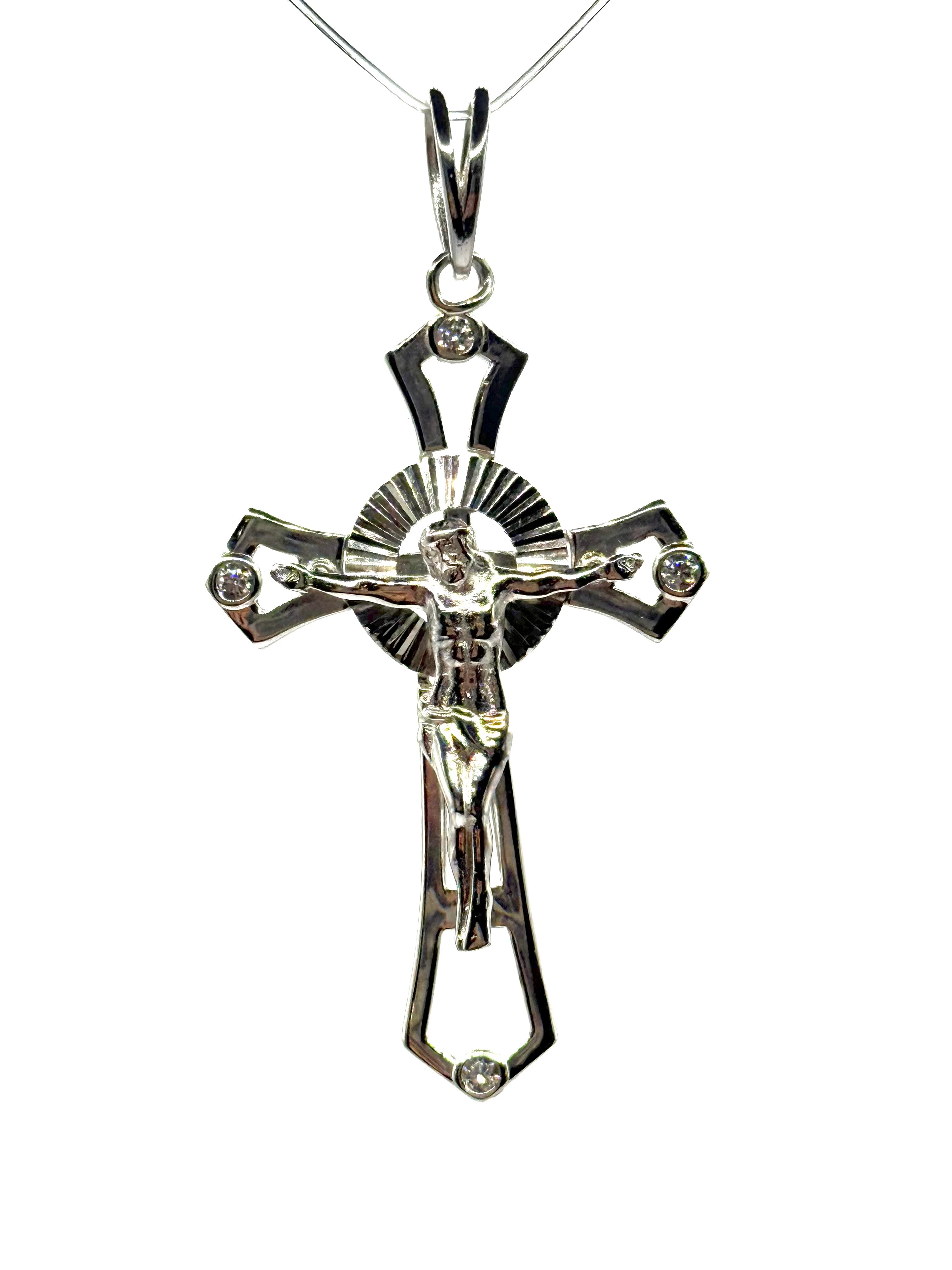Silver cross with bezel setting